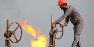 A man working at an oil refinery. 