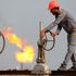 A man working at an oil refinery. 