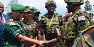 Soldiers walk at Goma Airport in eastern DRC