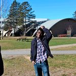 Serge Nouemssi speaks with another student in Canada