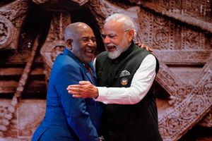 Narendra Modi gestures with African Union Chairman and Comoros President Azali Assoumani