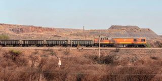 A general view a Transnet freight rail transport train near the Anglo American Sishen Iron Ore
