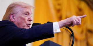 2025-12-17T021327Z_1773299038_RC22IIAIRH01_RTRMADP_3_USA-TRUMP